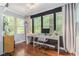 Bright office space with large windows and a modern desk setup, perfect for productivity at 5149 Roswell Rd # 1, Atlanta, GA 30342