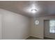 Carpeted bedroom with a standard window at 733 Emerald Forest Cir, Lawrenceville, GA 30044