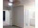 This spacious bedroom has a lighted ceiling fan and doors to other rooms at 733 Emerald Forest Cir, Lawrenceville, GA 30044