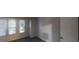 Bedroom with natural light fills the space through two large windows at 733 Emerald Forest Cir, Lawrenceville, GA 30044