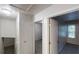 Upstairs hallway featuring a linen closet and two bedrooms at 733 Emerald Forest Cir, Lawrenceville, GA 30044