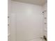 The bathroom's shower showcases a pristine white design and built-in shelving at 733 Emerald Forest Cir, Lawrenceville, GA 30044