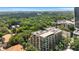 Captivating aerial view of an upscale condo surrounded by lush greenery and glimpses of the city skyline at 905 Juniper Ne St # 805, Atlanta, GA 30309