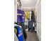 Organized closet with custom shelving for clothing and shoe storage at 905 Juniper Ne St # 805, Atlanta, GA 30309