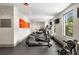 Fitness center equipped with treadmills, ellipticals, and weightlifting stations at 905 Juniper Ne St # 805, Atlanta, GA 30309