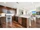 Well-appointed kitchen with stainless steel appliances, marble countertops, and hardwood floors at 905 Juniper Ne St # 805, Atlanta, GA 30309