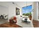 Open living area with hardwood floors, contemporary furnishings, and bright natural light at 905 Juniper Ne St # 805, Atlanta, GA 30309
