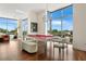 Spacious room featuring a billiard table and lots of natural light from large windows at 905 Juniper Ne St # 805, Atlanta, GA 30309