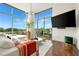 Bright living area with large windows, hardwood floors, and comfortable modern furniture at 905 Juniper Ne St # 805, Atlanta, GA 30309