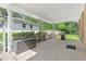 Covered back porch perfect for outdoor relaxing and grilling in a private backyard at 2483 Hunting Valley Dr, Decatur, GA 30033