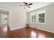 Spacious bedroom featuring hardwood floors and two windows at 2483 Hunting Valley Dr, Decatur, GA 30033