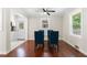 Elegant dining room featuring hardwood floors and a modern glass table at 2483 Hunting Valley Dr, Decatur, GA 30033