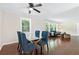 Open dining area with stylish chairs and hardwood flooring, ideal for entertaining at 2483 Hunting Valley Dr, Decatur, GA 30033