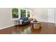 Bright and airy living room with hardwood flooring, ample natural light, and neutral decor at 2483 Hunting Valley Dr, Decatur, GA 30033