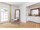 An open bathroom with an elegant stone sink, white cabinetry, and view to backyard at 2658 Briarlake Ne Rd, Atlanta, GA 30345