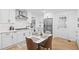 White kitchen with updated appliances, plenty of counter space and seating for your daily dining needs at 2658 Briarlake Ne Rd, Atlanta, GA 30345