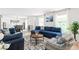 Bright living room with blue accents and comfortable seating at 2658 Briarlake Ne Rd, Atlanta, GA 30345