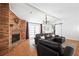 Spacious living area with brick fireplace and sliding doors at 2658 Briarlake Ne Rd, Atlanta, GA 30345