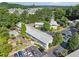 Aerial view of a well maintained property with mature trees and plenty of parking at 3048 Briarcliff Ne Rd # 9, Atlanta, GA 30329