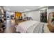 Open bedroom with a sliding barn door, wardrobe, and easy access to the living area at 3048 Briarcliff Ne Rd # 9, Atlanta, GA 30329