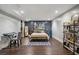 Bright bedroom featuring a stylish bed, city-themed decor, and wood-look flooring at 3048 Briarcliff Ne Rd # 9, Atlanta, GA 30329