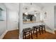 Kitchen bar featuring granite countertops, pendant lighting, and seating for three stools at 3048 Briarcliff Ne Rd # 9, Atlanta, GA 30329