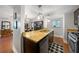 Modern kitchen featuring granite countertops, stainless steel appliances, and dark wood cabinets at 3048 Briarcliff Ne Rd # 9, Atlanta, GA 30329