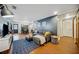 Open-concept living space with comfortable seating, a blue rug, and easy access to the dining area at 3048 Briarcliff Ne Rd # 9, Atlanta, GA 30329