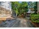 A communal outdoor seating area provides a place to relax in a lush green environment at 3048 Briarcliff Ne Rd # 9, Atlanta, GA 30329