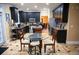 Eat-in kitchen with granite counters, black cabinetry, stainless steel appliances, and tile floor at 3310 Mcclure Woods Ct, Duluth, GA 30096