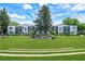 Exterior view of building featuring lush landscaping and common area at 68 Peachtree Memorial Nw Dr # 68-5, Atlanta, GA 30309