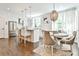 Modern kitchen featuring stainless steel appliances, pendant lighting, and an island with barstool seating at 68 Peachtree Memorial Nw Dr # 68-5, Atlanta, GA 30309