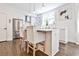 Modern kitchen with stainless steel appliances, island seating, and plenty of natural light at 68 Peachtree Memorial Nw Dr # 68-5, Atlanta, GA 30309