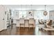 Open kitchen and dining area with hardwood floors, stainless steel appliances, and stylish decor at 68 Peachtree Memorial Nw Dr # 68-5, Atlanta, GA 30309