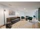 Contemporary living room features stylish seating, modern lighting, and chic decor with a neutral color palette at 68 Peachtree Memorial Nw Dr # 68-5, Atlanta, GA 30309