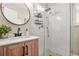Stylish bathroom features a white subway tile shower and a wood vanity with a vessel sink at 727 Holmes Nw St, Atlanta, GA 30318