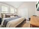 Bedroom featuring vaulted ceilings, a comfortable bed, and natural light at 727 Holmes Nw St, Atlanta, GA 30318