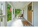 Inviting front porch with a cozy seating area and stylish welcome decor at 727 Holmes Nw St, Atlanta, GA 30318