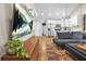 Bright, open-concept living space flows into a modern kitchen with stainless steel appliances at 727 Holmes Nw St, Atlanta, GA 30318