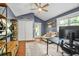 Home office featuring a ceiling fan, hardwood floors, and ample natural light at 727 Holmes Nw St, Atlanta, GA 30318
