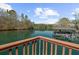 Scenic view of a tranquil lake with boat docks, captured from a residential balcony at 1525 Lockridge Dr, Cumming, GA 30041