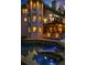 A stone pool and spa are the focal points of this outdoor lake home at 1525 Lockridge Dr, Cumming, GA 30041