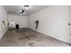 Clean car wash station with power washer hose and nozzle, and a blue overhead cleaning arm at 199 14Th Street Ne St # 2501, Atlanta, GA 30309