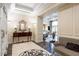 Elegant foyer featuring decorative tile flooring, sconces, and furniture at 199 14Th Street Ne St # 2501, Atlanta, GA 30309