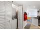 Convenient laundry area with stacked washer and dryer unit, tucked behind louvered doors at 199 14Th Street Ne St # 2501, Atlanta, GA 30309
