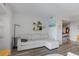 Comfortable living room with a sectional sofa, unique shelving, and views into the dining area at 199 14Th Street Ne St # 2501, Atlanta, GA 30309