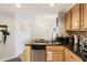 Updated kitchen with granite counters, stainless steel dishwasher, and stylish cabinets at 199 14Th Street Northeast Ne St # 2501, Atlanta, GA 30309