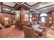Elegant living room with rich wood paneling, classic furnishings, and comfortable seating arrangements at 199 14Th Street Northeast Ne St # 2501, Atlanta, GA 30309