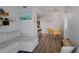 Open living space featuring a modern sofa, dining area, and seamless flow throughout at 199 14Th Street Northeast Ne St # 2501, Atlanta, GA 30309