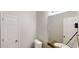 Simple bathroom featuring a toilet, vanity, and a large mirror at 2320 Polaris Sw Way, Atlanta, GA 30331